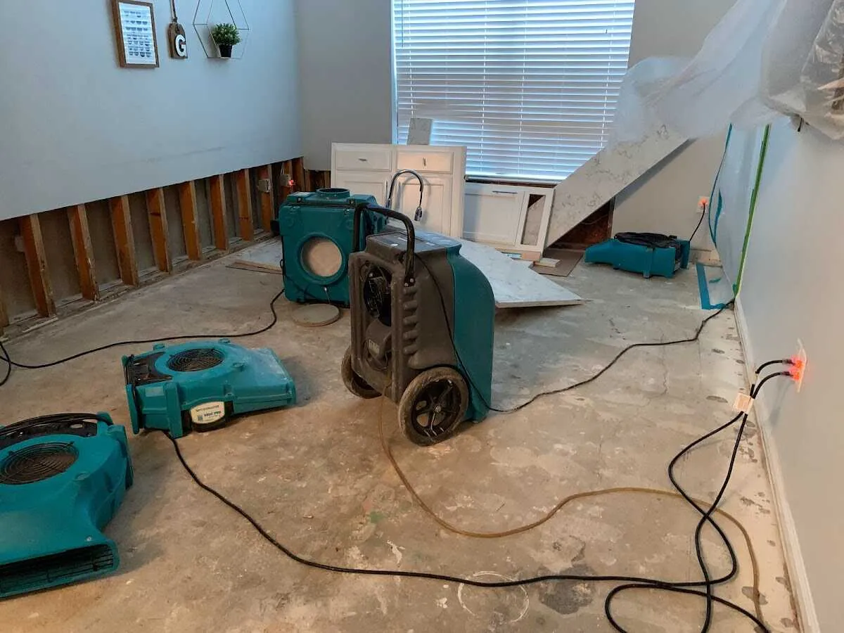 Dehumidifier in flood-cut room for Water Damage Restoration in Iroquois Point